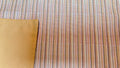 Mantel Individual color Amarillo rayas reverso amarillo.
