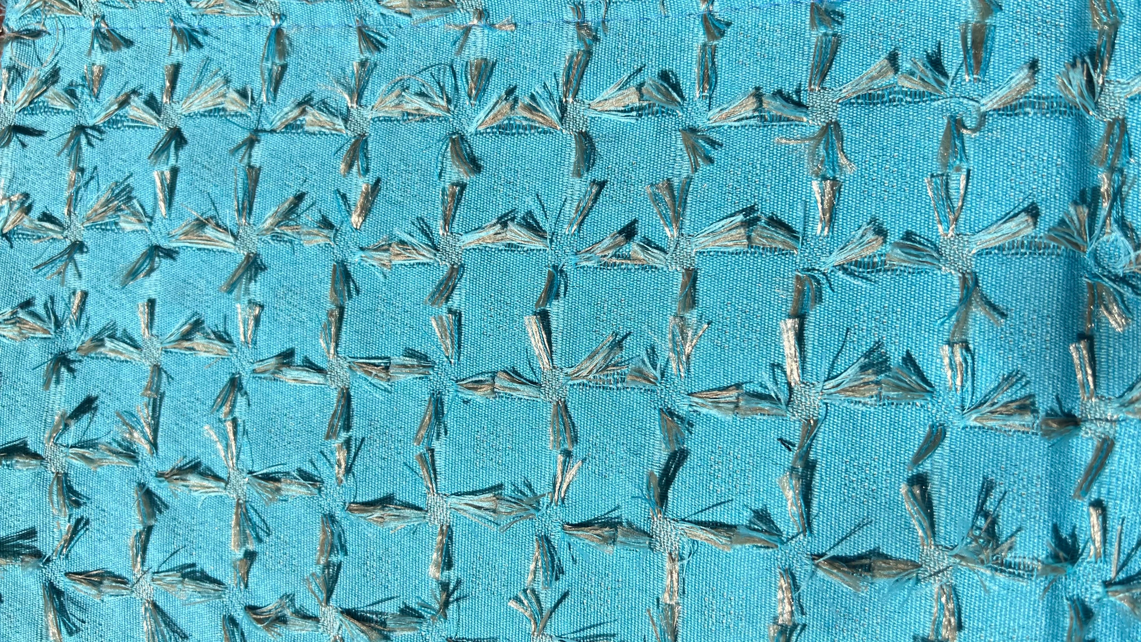 Camino de mesa modelo Deshilado en color aqua.