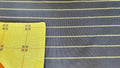 Mantel individual modelo Rayas azul, reverso limon.